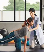 Guided post medical recovery movement with professional support.